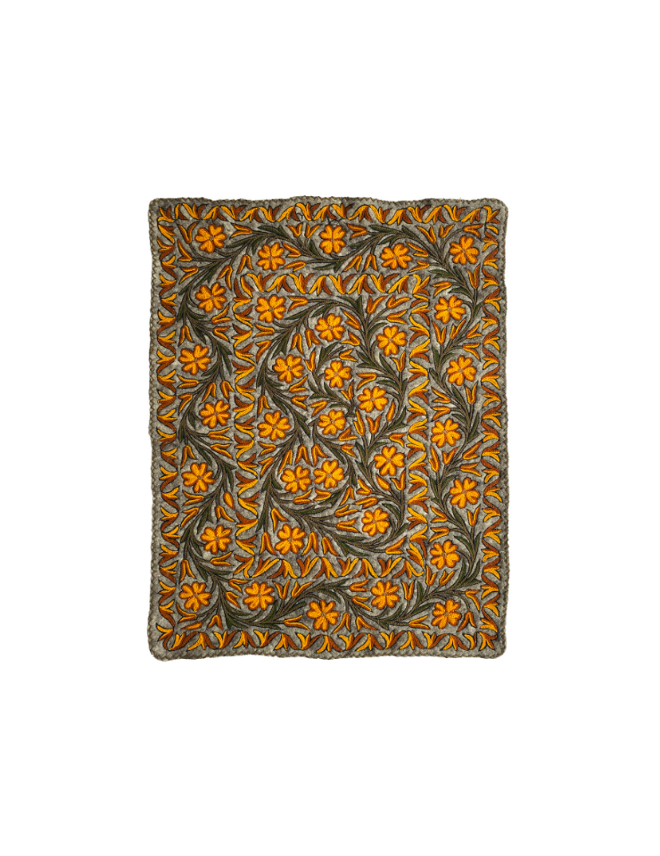 Decorative mat with floral pattern on a white background