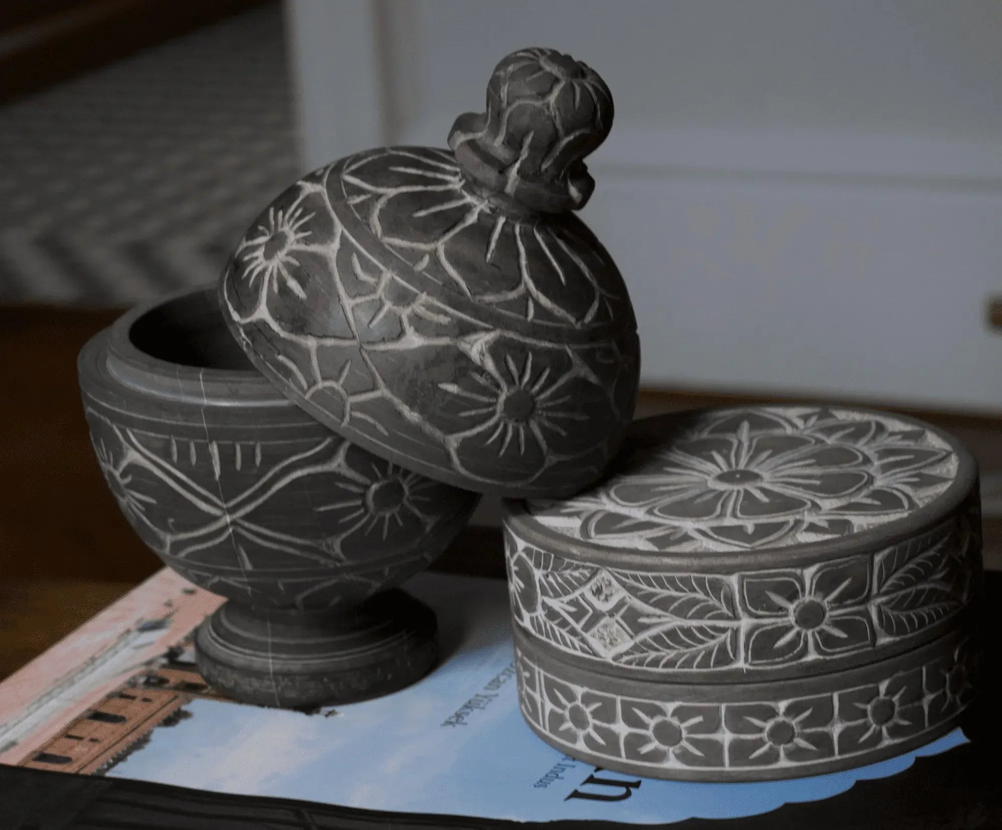 Handcrafted Pakistani ceramic containers with intricate floral patterns, decorative home decor